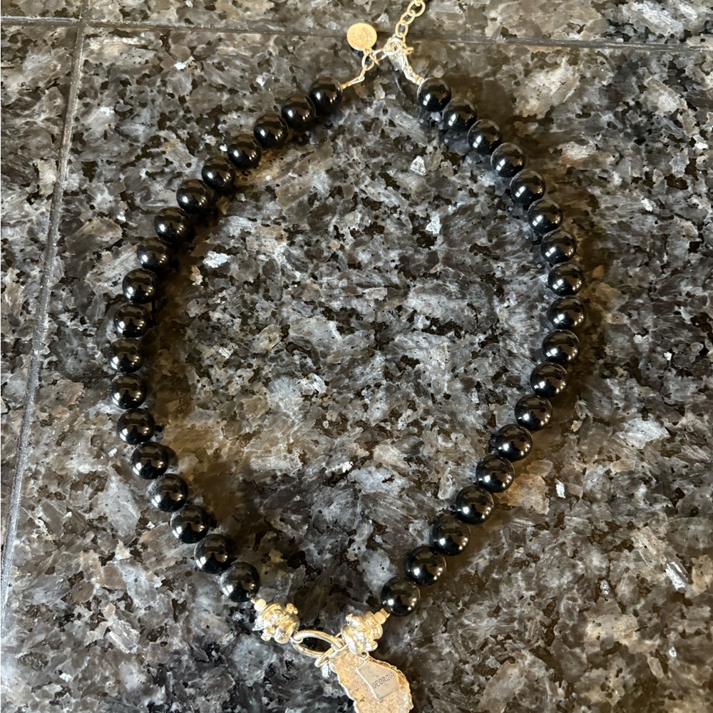 Sophisticated Black Beaded Necklace with Silver Charm